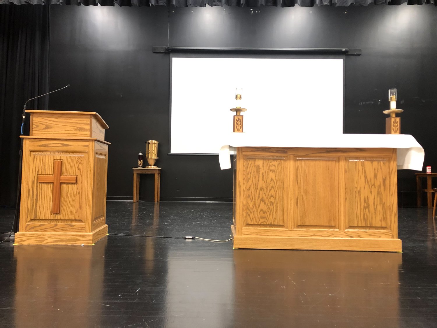 Cathedral of St. Joseph parishioner Clarence Koenigsfeld’s cabinet company made the temporary altar and pulpit for use while the Cathedral is being renovated this year.